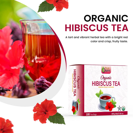 Organic hibiscus tea packaging and a glass of bright red herbal tea with hibiscus flowers
