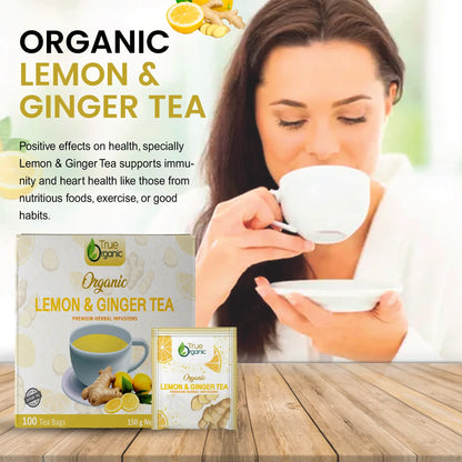 Woman enjoying organic lemon and ginger tea with product box and tea bag on wooden table