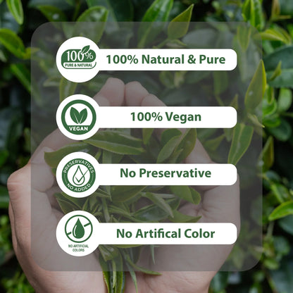 Hands holding green leaves with labels 100% natural, vegan, no preservative, no artificial color