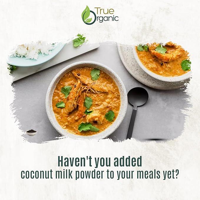 Two bowls of prawn curry garnished with cilantro and a plate of white rice on a gray surface with True Organic branding