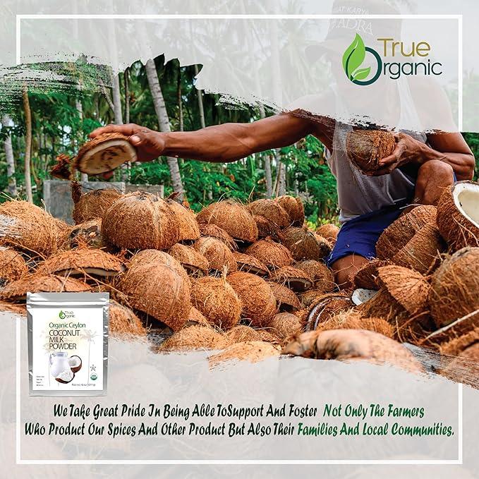 Farmer harvesting coconuts amidst a pile of cracked coconut shells in a tropical farm setting