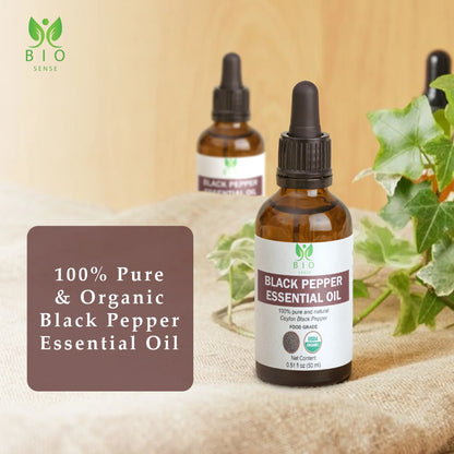 Bio Sense black pepper essential oil bottle with label, dropper cap, organic and pure oil on fabric