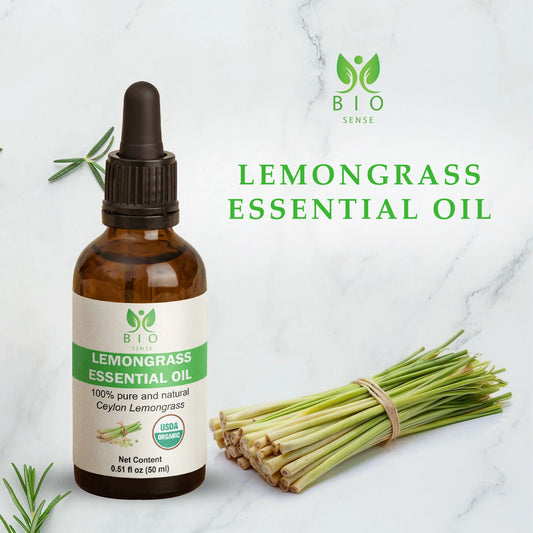 Bio Sense lemongrass essential oil bottle with fresh lemongrass bundle on marble background