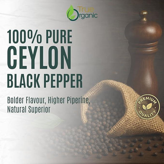 Advertisement for 100% pure Ceylon black pepper with a wooden pepper grinder and burlap bag.